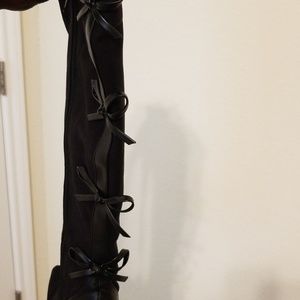 Black suede and leather bowtie boots